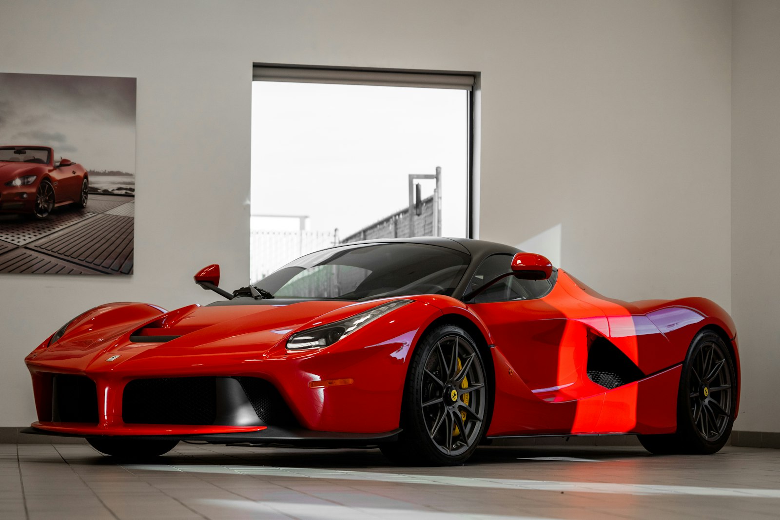 A gleaming sports car displayed in a dealership showroom, evoking the feeling of walking into a trap.